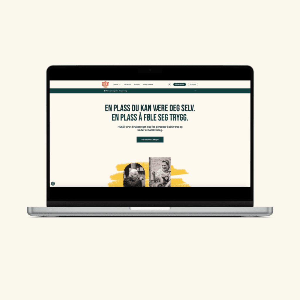Mockup som viser nettsidene til huset bergen på en laptop