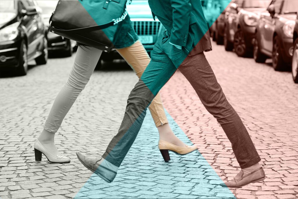 Illustrasjon fra nyboligprosjektet Kronstad X som viser to personer som går og møtes slik at beina former en X